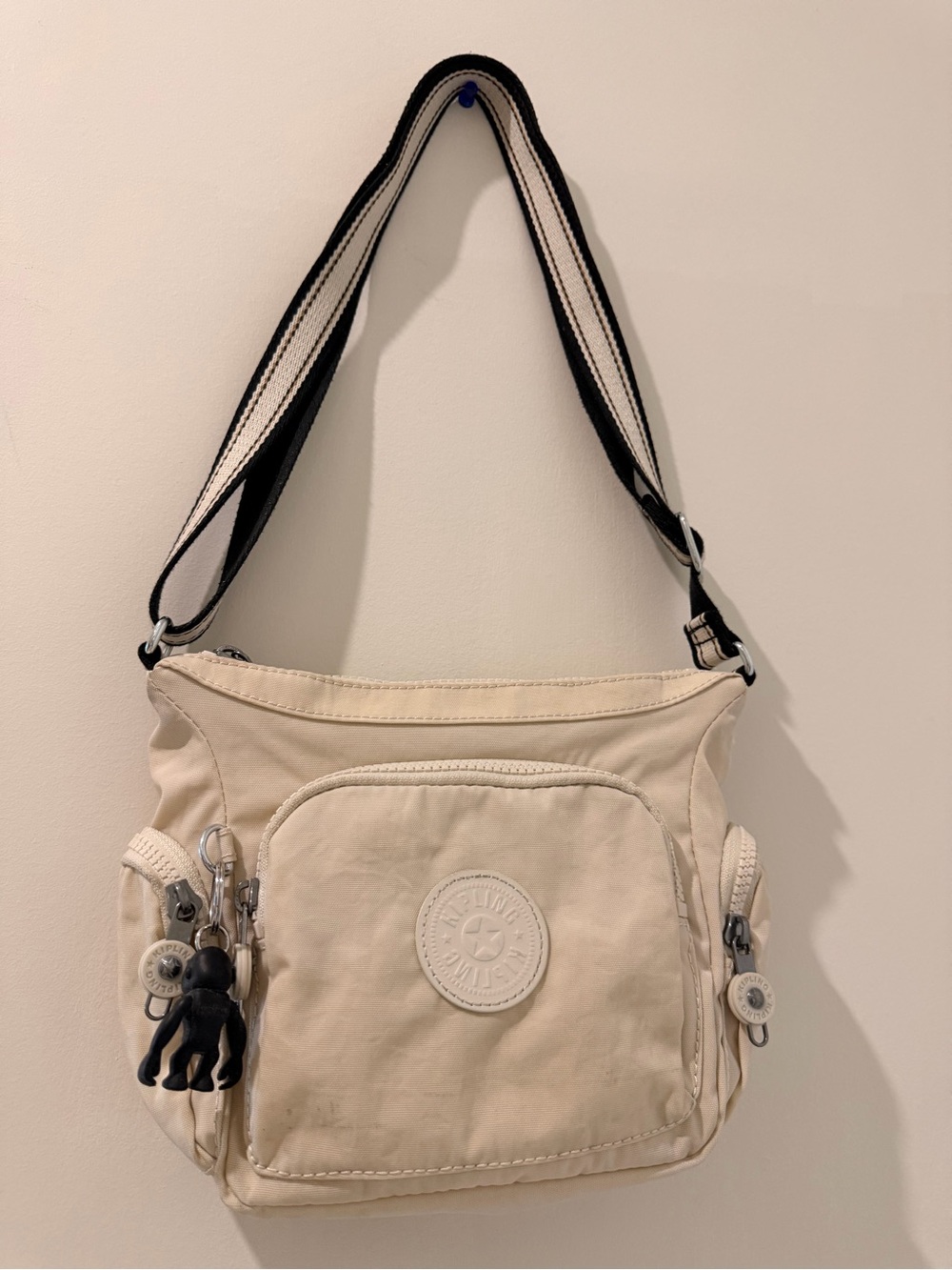 Kipling Cream Crossbody Bag with Black-Trim Strap